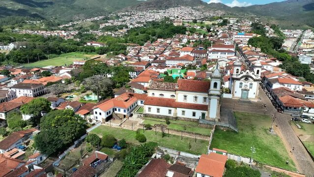 Explore the stunning S&atilde;o Francisco de Assis Church in Mariana, Minas Gerais, Brazil, in the daylight, captured with the powerful DJI Mavic 3 drone. Discover the beauty and grandeur of this historical 