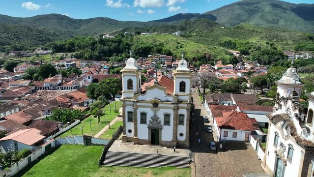 Explore the stunning S&atilde;o Francisco de Assis Church in Mariana, Minas Gerais, Brazil, in the daylight, captured with the powerful DJI Mavic 3 drone. Discover the beauty and grandeur of this historical 
