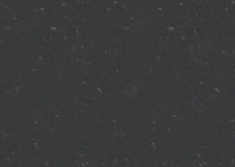 Seamless smooth grey black paper texture with white spots. Decorative backdrop surface wallpaper background.