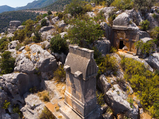 Sura, ancient town in Lycia. View of tombs on rocky hill in Antalya, Turkey.