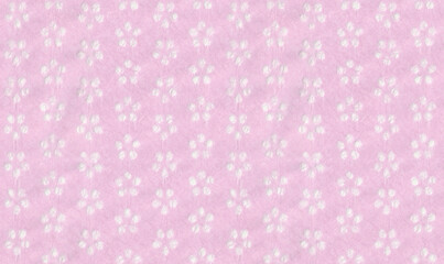 Seamless texture of a pink napkin with a pattern of floral flowers stencils holes. Decorative scrapbook paper for decoration.