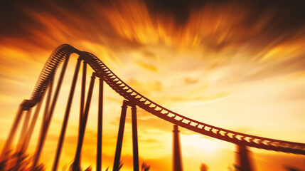 Obraz premium Rollercoaster at sunset, motion blur