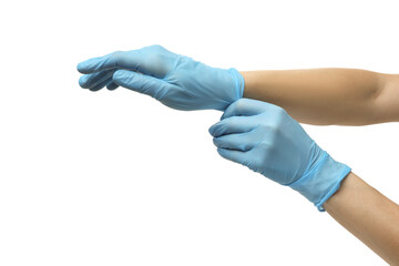 Doctor wearing light blue medical gloves on white background, closeup