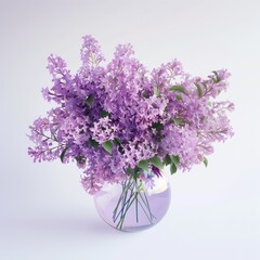 A beautiful lush bouquet of lilac in a small vase