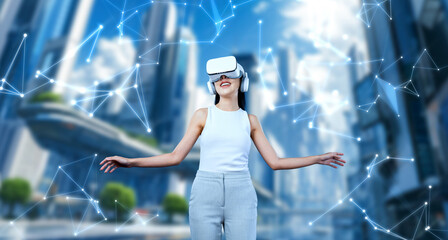 Female stand wear white VR headset and white sleeveless connect metaverse, future technology create...