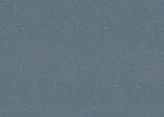 Seamless dark blue grey paper texture with little small pieces of straws and fibers. Smooth cardboard surface.