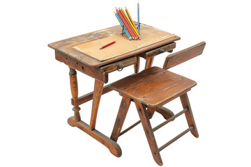 Fototapeta premium Wooden table with assorted pencils, brushes, and pens