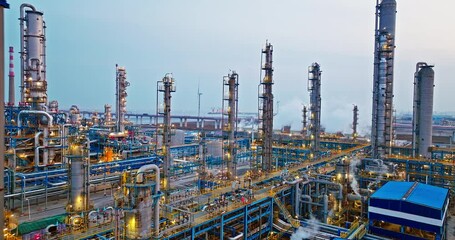 Aerial view of industrial area refinery and chemical plant at sunset