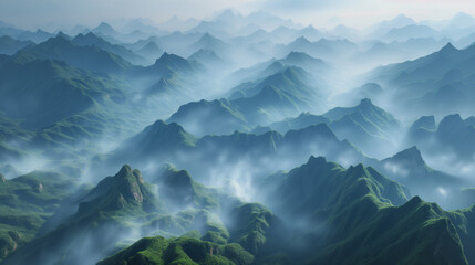 expanse of green hills with fog