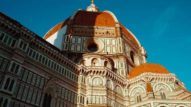 Revealing the famous Florence Cathedral, also known as Cattedrale di Santa Maria del Fiore or Duomo di Firenze, embodying the Renaissance spirit in Tuscany, Italy