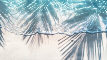 Top view of tropical leaf shadow on water surface. Shadow of palm leaves on white sand beach. Beautiful abstract background concept banner.