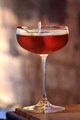 Manhattan, classic drink with whiskey, sweet vermouth, dry vermouth, angostura and ice