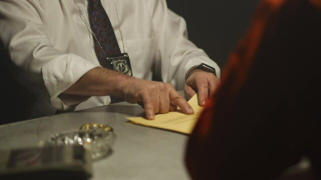 Police team asking questions to inmate for case files