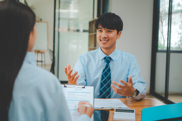 Job applicant introducing himself For a job interview after submitting a resume document to the...