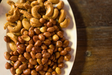 Peanuts and cashews, snacks at pub. Food and beverage lifestyle concept