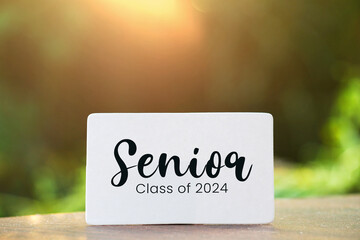Senior class of 2024 card with bokeh background. Senior 2024. congratulations graduates. 