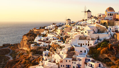 Panoramic landscape in Oia city on Santorini island, Greece at sunset	