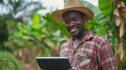 African Farmer Plans Agriculture Development on Tablet, Ensuring Sustainable Growth in Organic Farming