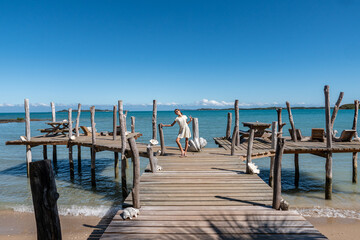 Person pier on the beach