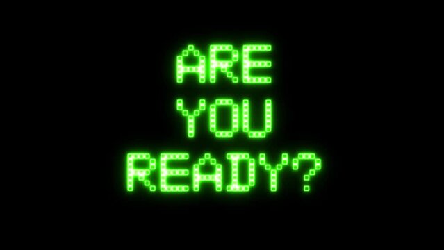 Animation: flickering neon text appears on the screen, asking Are you ready? Retro-futuristic green blocks style.