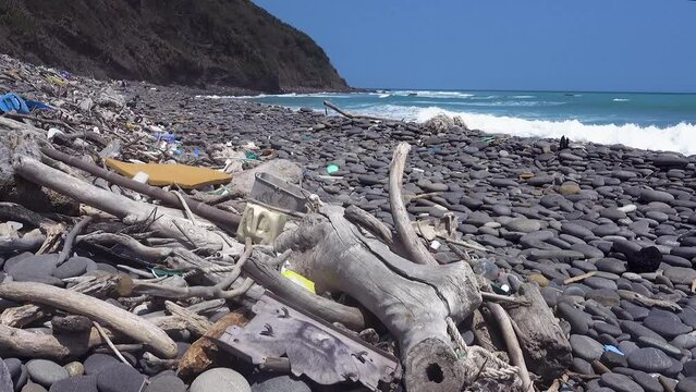 marine garbage debris driftwood Styrofoam Polystyrene foam. Plastic box on deserted shore magnificent coastline stretches behind, Environmental pollution issues.