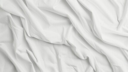 Fototapeta premium close-up photo of a plain white T-shirt, with soft wrinkles and folds, on a clean white background. 