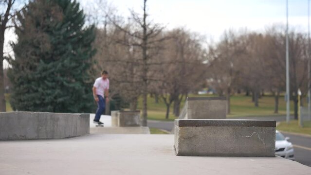 man does a kickflip up the ramp and then grinds the ledge on their skateboard