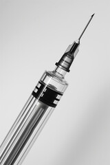 a medical syringe on white background