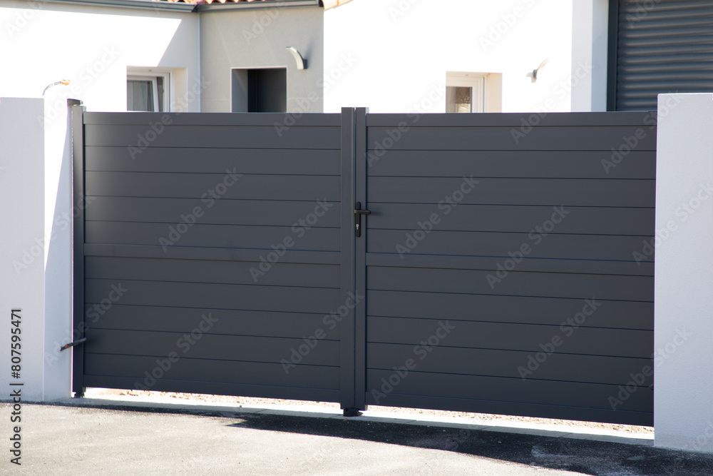 Wall mural door grey high modern entrance slide steel gate aluminum portal of home suburbs house facade