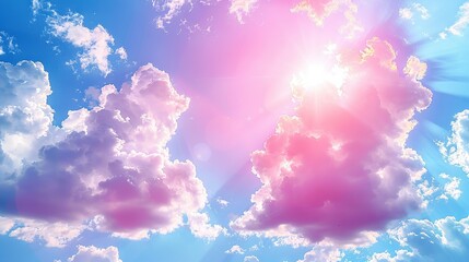   Sun brightly shining through blue-sky clouds with pink-white foreground