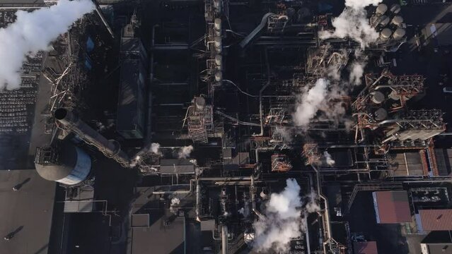 Industrial complex in hamilton with smokestacks, during the day, aerial view