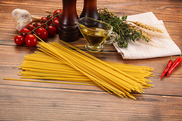 Raw dry Italian pasta - spaghetti