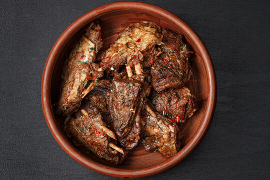 a bowl of meat with spices