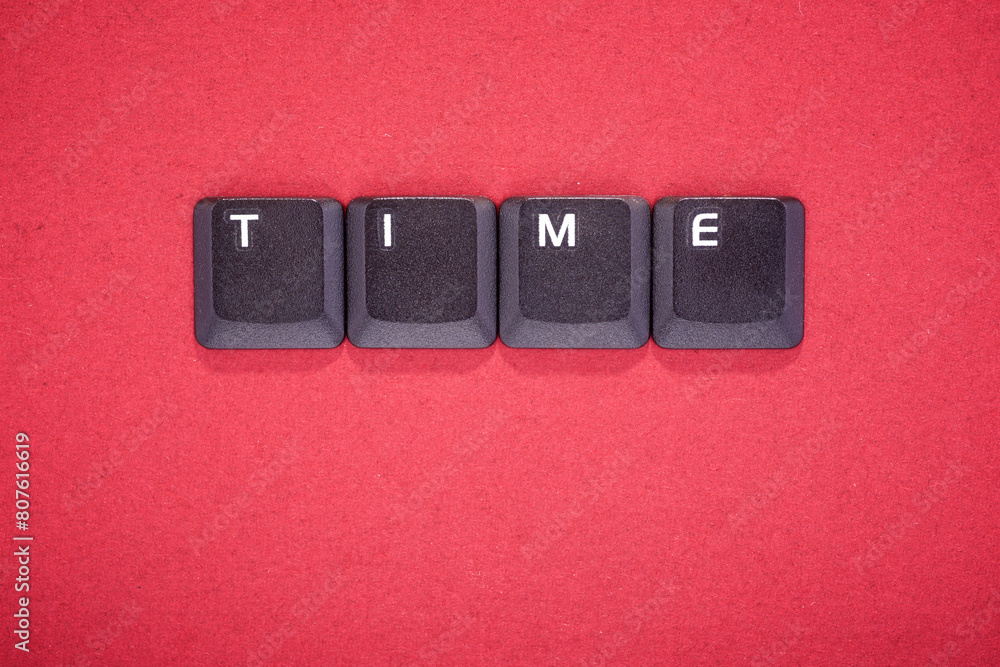 Poster close-up of the keys of an old keyboard creating time word