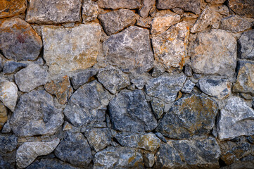 stone fence as a background for a photo 1