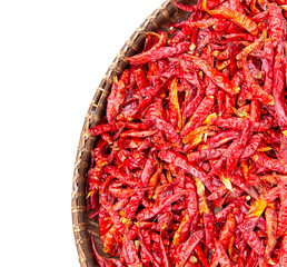 Red chili peppers in a basket isolated white background