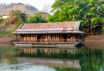 Fototapeta premium Houses on the River Kwai in Thailand