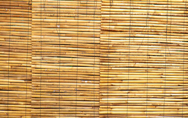 Dry bamboo fence as an abstract background. Texture
