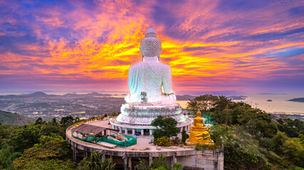 Sunrise at the Big Buddha located on the top of a mountain is a scenic spot in Phuket Province,...