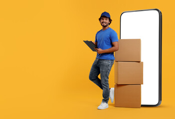Courier with stack of parcels and clipboard near huge smartphone on orange background. Delivery...