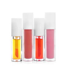 Many different lip glosses isolated on white