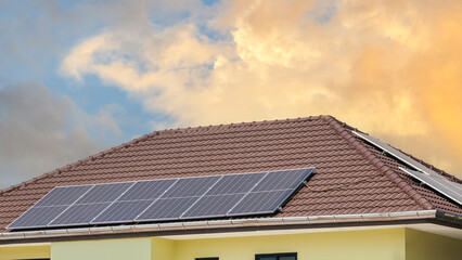 Fototapeta premium Solar panels on roofs, Houses with solar panels, Modern eco green house concepts