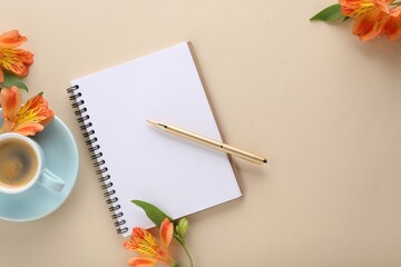 Guest list. Notebook, pen, coffee and beautiful flowers on beige table, flat lay. Space for text