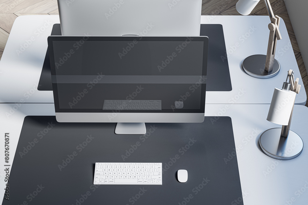 Aufkleber close up and above view of designer office desk with mock up computer screen on white desk, rug, lam
