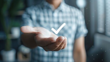 Photograph a hand gesturing towards a finished product, with the check mark symbol proudly displayed, representing excellence in quality assurance.