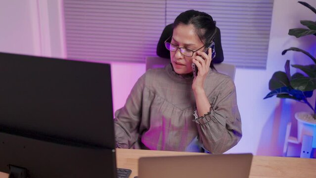 Close-up of a female software developer trying to solve a computer problem where hackers stole important items and lost them. One woman immediately called the protection team.