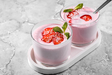 Panna cotta with strawberries and mint