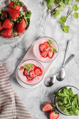 Panna cotta with strawberries and mint