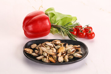 Marinated mussels in the bowl