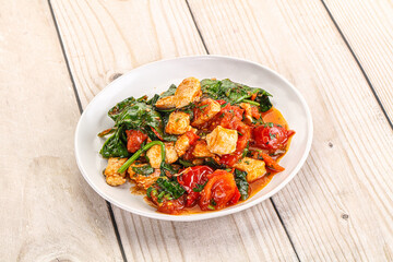 Chicken with tomato and spinach